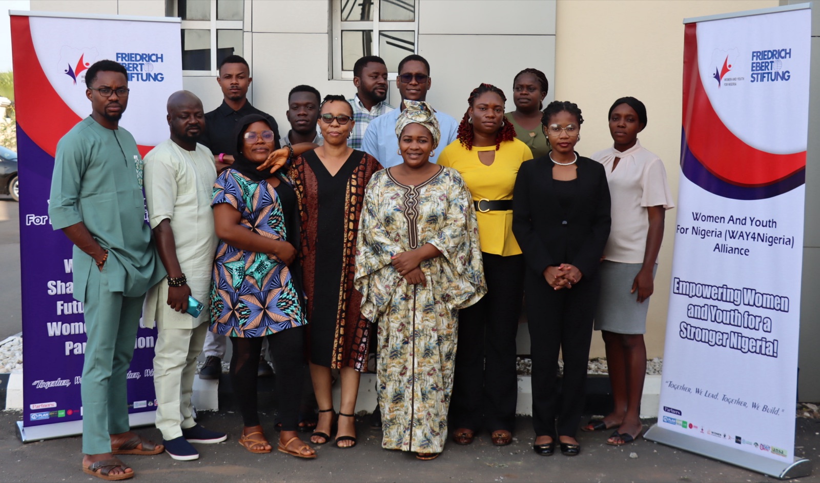 The full WAY4Nigeria alliance cohort beside FES banners