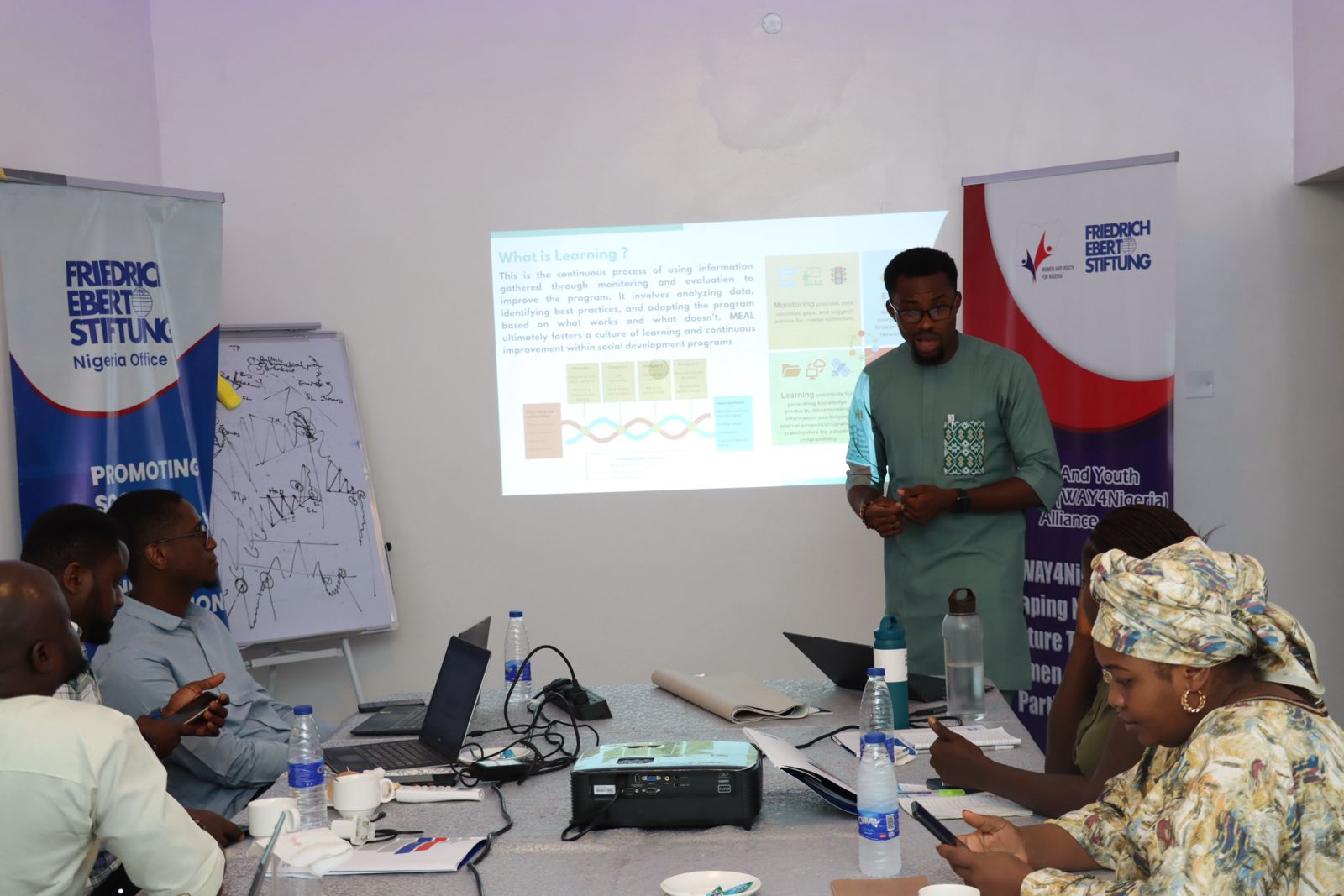 An alliance member presenting during a training session